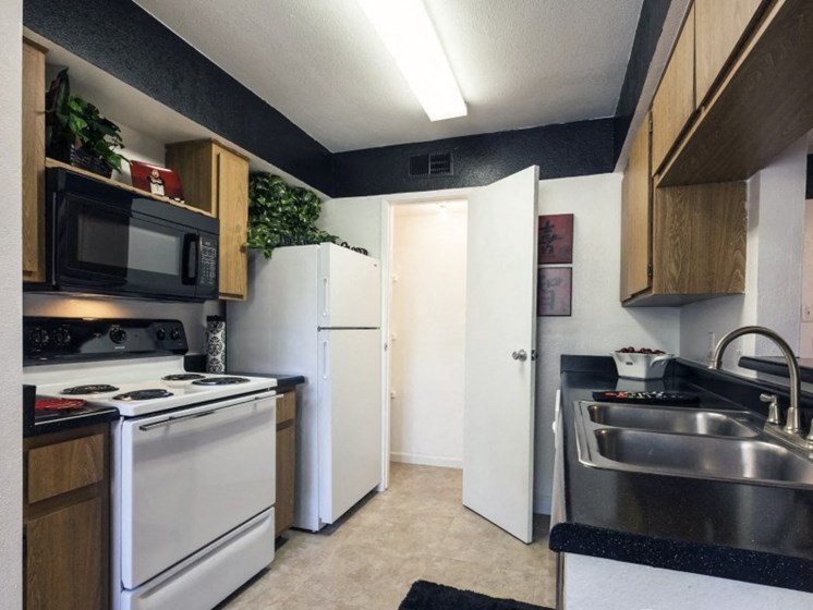 Kitchen (Non-Renovated Apartment) at Presidio North Apartments in Phoenix, AZ